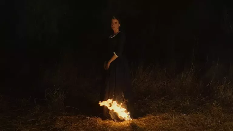 Portrait of a young woman on fire