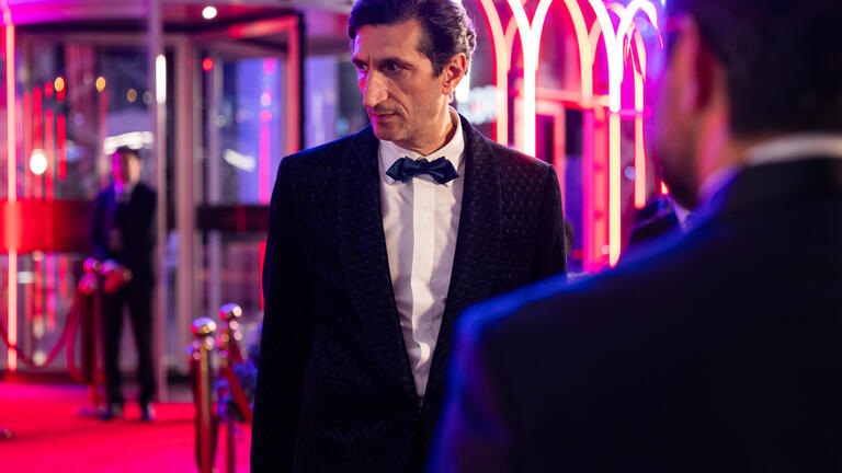 Fares Fares as George